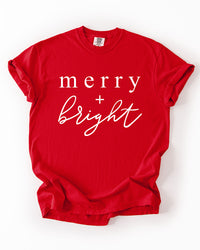 Red Merry + Bright heavyweight Christmas tee with white holiday graphic