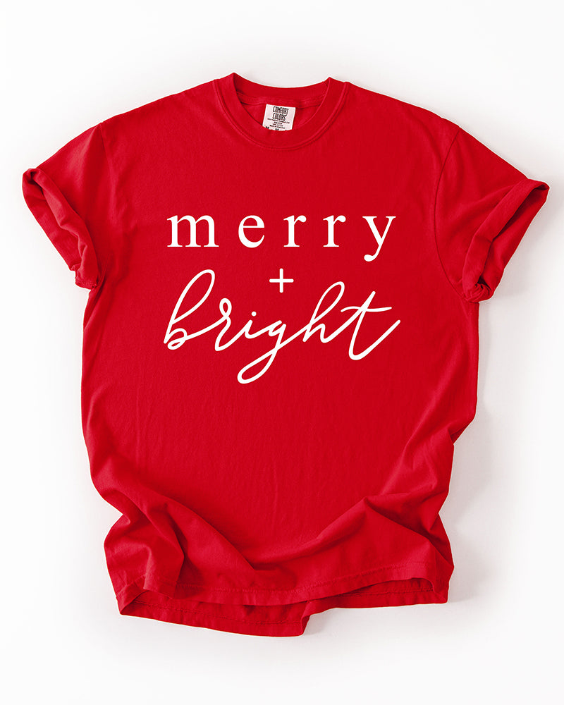 Red Merry + Bright heavyweight Christmas tee with white holiday graphic
