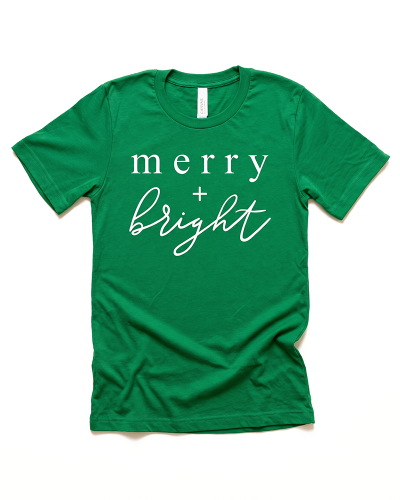 Kelly green Merry + Bright Christmas t-shirt with white holiday graphic