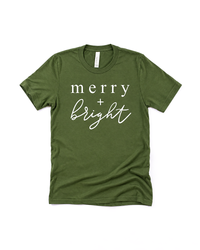 Olive Merry + Bright Christmas graphic tee with white lettering