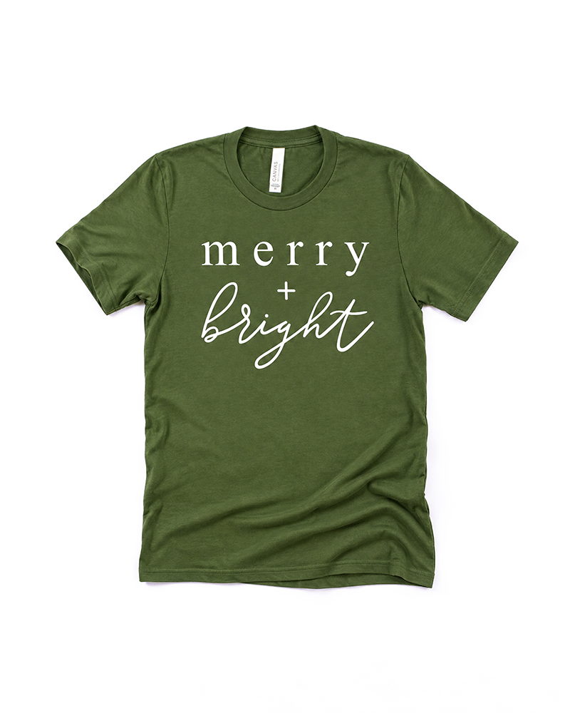 Olive Merry + Bright Christmas graphic tee with white lettering
