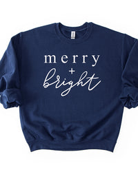 Navy Merry + Bright Christmas crewneck sweatshirt with white lettering