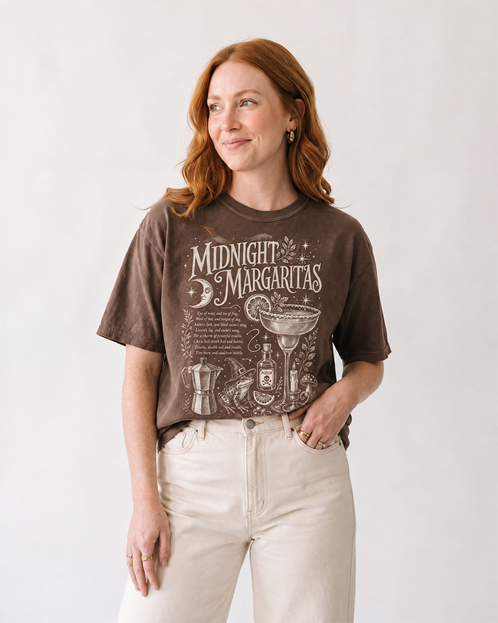 Woman wearing espresso brown Midnight Margaritas vintage witchy t-shirt