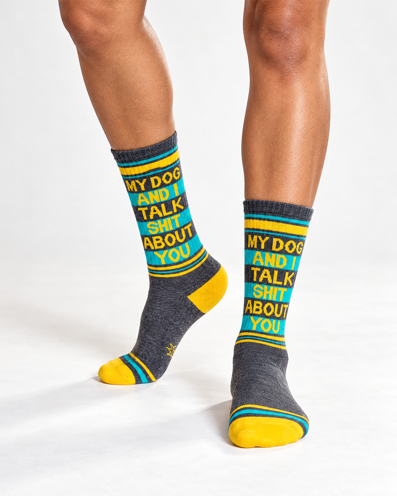 Funny dog lover gym socks on model featuring My Dog and I Talk Shit About You lettering