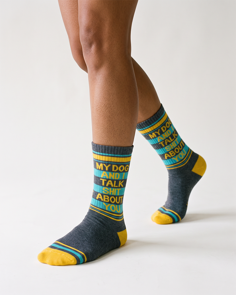 Model wearing My Dog and I Talk Shit About You heather gray gym socks with turquoise and yellow stripes