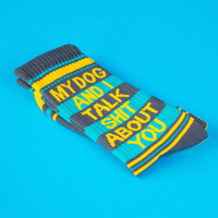 Folded My Dog and I Talk Shit About You novelty crew socks showing bold yellow lettering