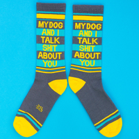 Pair of heather gray funny dog socks with turquoise panels, yellow lettering and contrasting toes