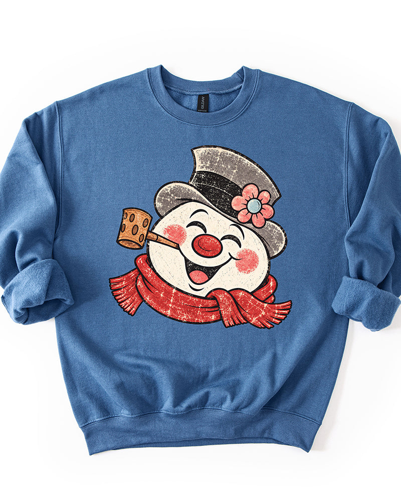 Indigo blue Retro Frosty Snowman Christmas crewneck sweatshirt with oversized smiling snowman graphic and rolled sleeves.