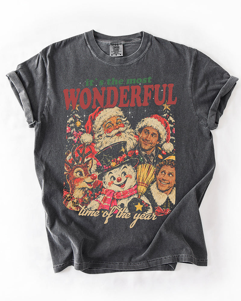 Pepper gray heavyweight Christmas T-shirt featuring nostalgic Santa, snowman, reindeer, and Christmas movie character artwork.