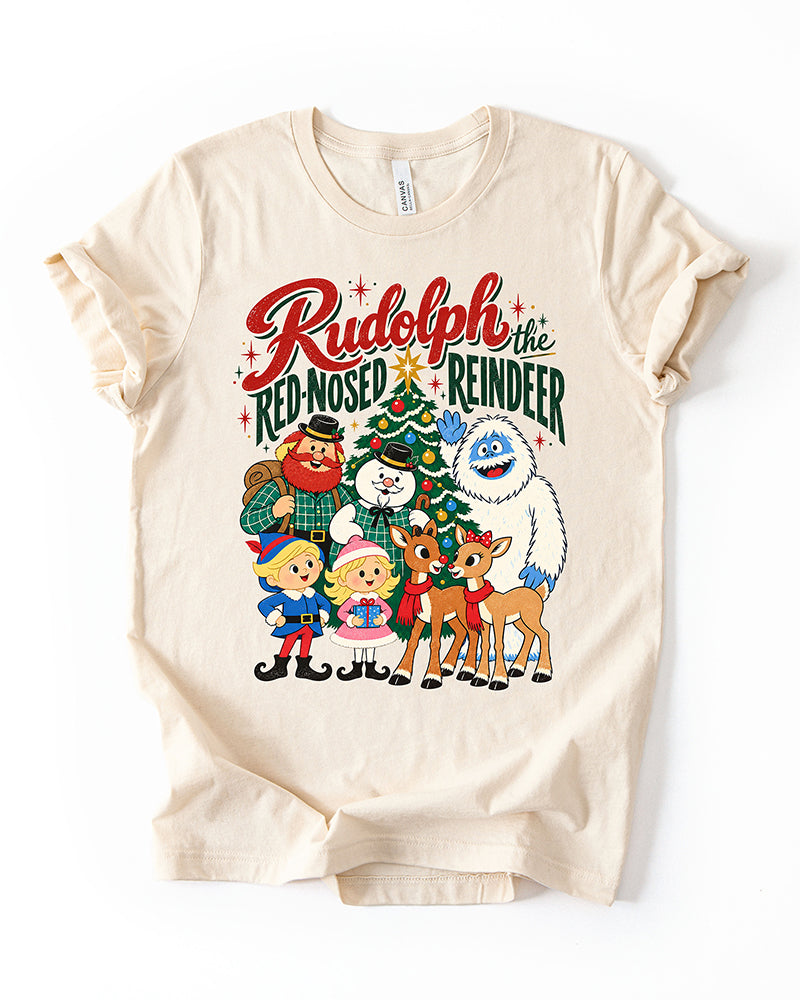 Natural ivory Rudolph the Red-Nosed Reindeer Christmas lightweight T-shirt featuring colorful retro lettering and classic holiday cartoon characters.