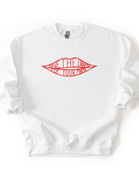 White crewneck sweatshirt featuring a red lips graphic with Save The Drama For Your Mama lettering.
