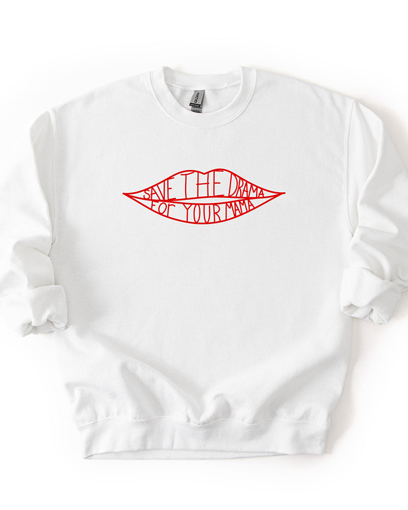 White crewneck sweatshirt featuring a red lips graphic with Save The Drama For Your Mama lettering.