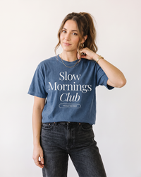 Woman wearing Denim Slow Mornings Club heavyweight graphic tee