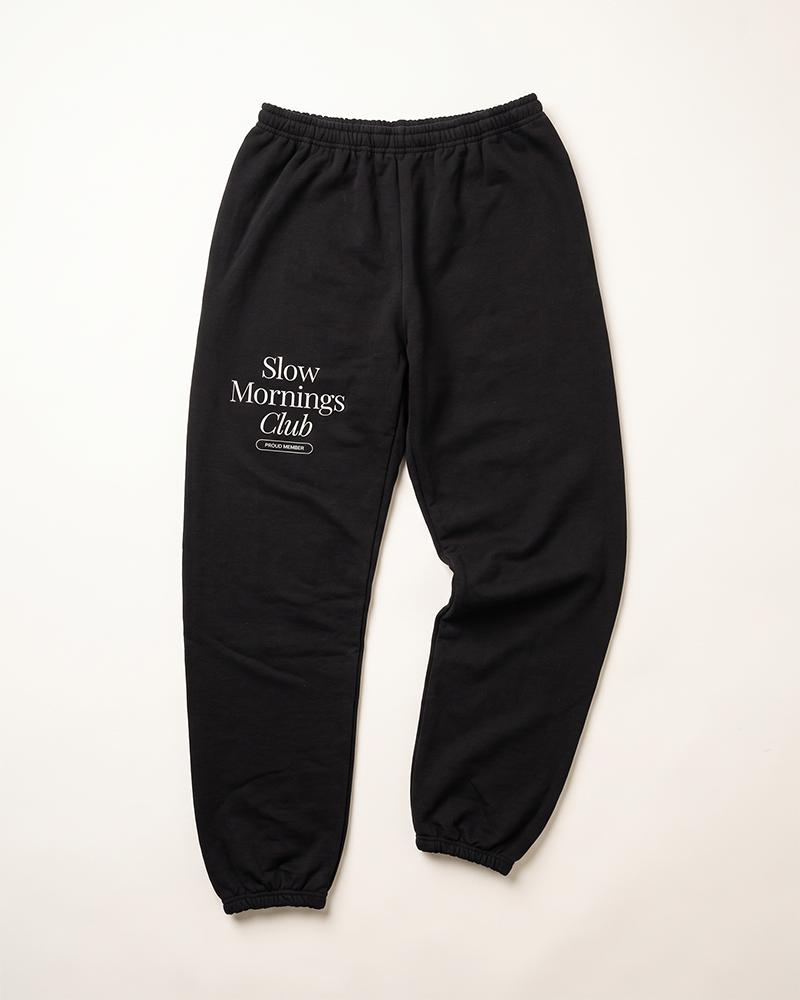 Black Slow Mornings Club graphic sweatpants with elastic cuffs
