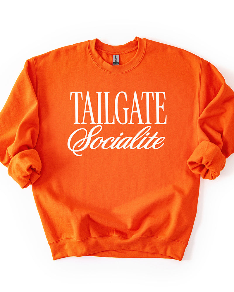 Orange Tailgate Socialite crewneck sweatshirt with white graphic, women's football game day sweatshirt