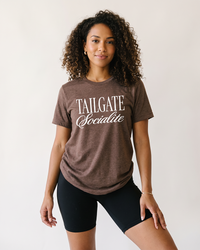 Woman wearing Tailgate Socialite heather brown football tailgate tee