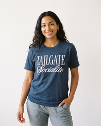 Woman wearing Tailgate Socialite heather navy game day graphic tee