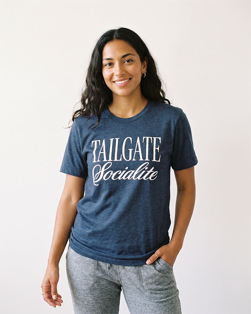 Woman wearing Tailgate Socialite heather navy game day graphic tee
