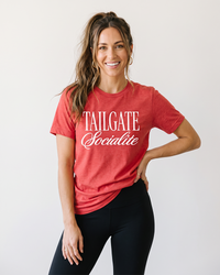 Woman wearing Tailgate Socialite heather red game day graphic tee