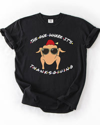 Black heavyweight Thanksgiving graphic T-shirt featuring a cartoon turkey wearing sunglasses and a fez with The One Where It's Thanksgiving lettering.