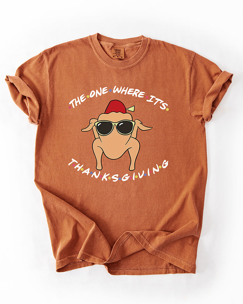 Yam orange heavyweight graphic tee featuring The One Where It's Thanksgiving turkey artwork inspired by the Friends sitcom.