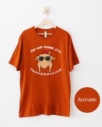 Autumn orange Thanksgiving graphic tee featuring a cartoon turkey with sunglasses and a fez inspired by the Friends sitcom.