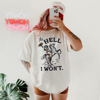 Woman wearing The Hell I Won’t Cowgirl Tee in ivory — western graphic t-shirt for women