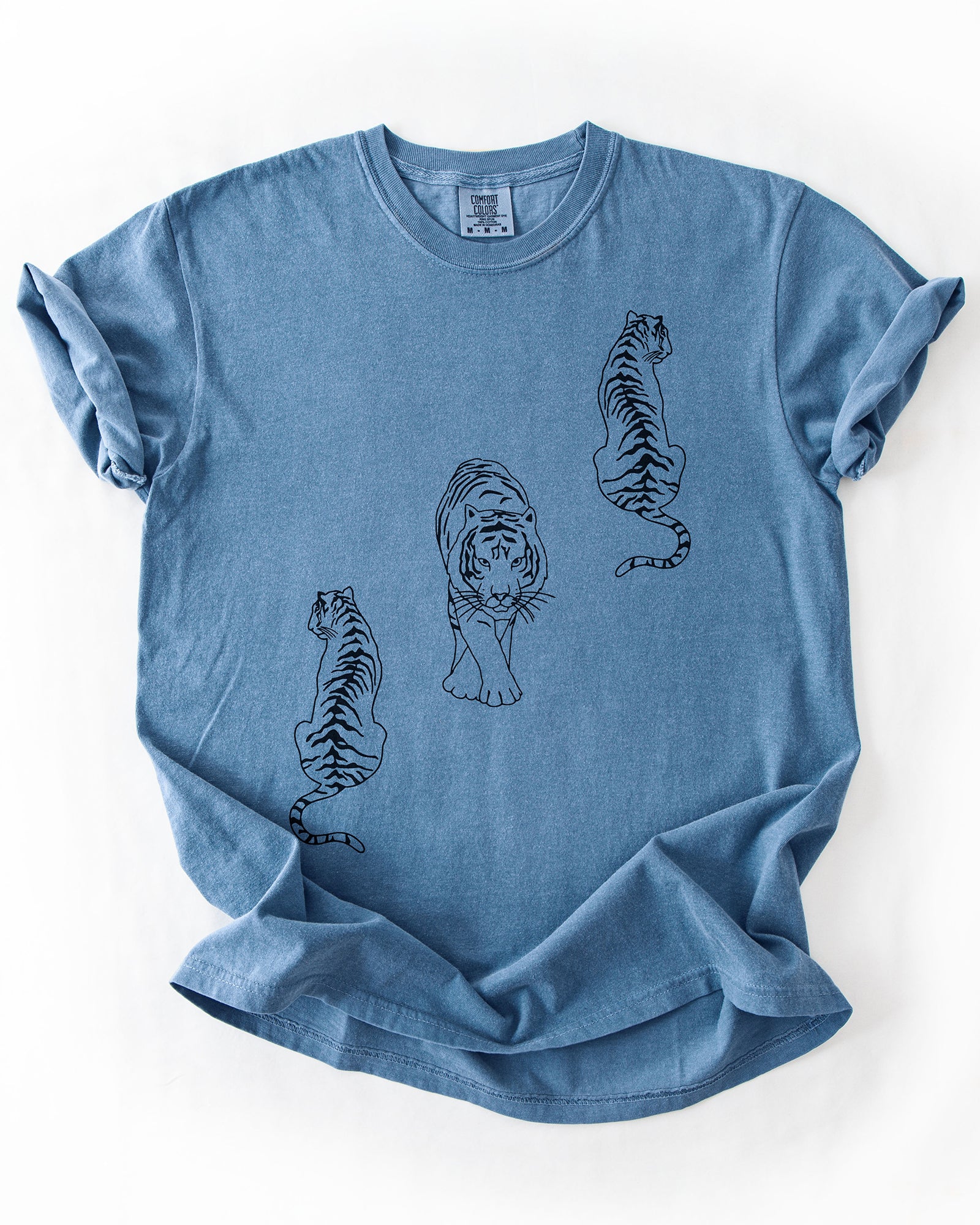 Blue Jean heavyweight graphic t-shirt featuring three black tiger illustrations