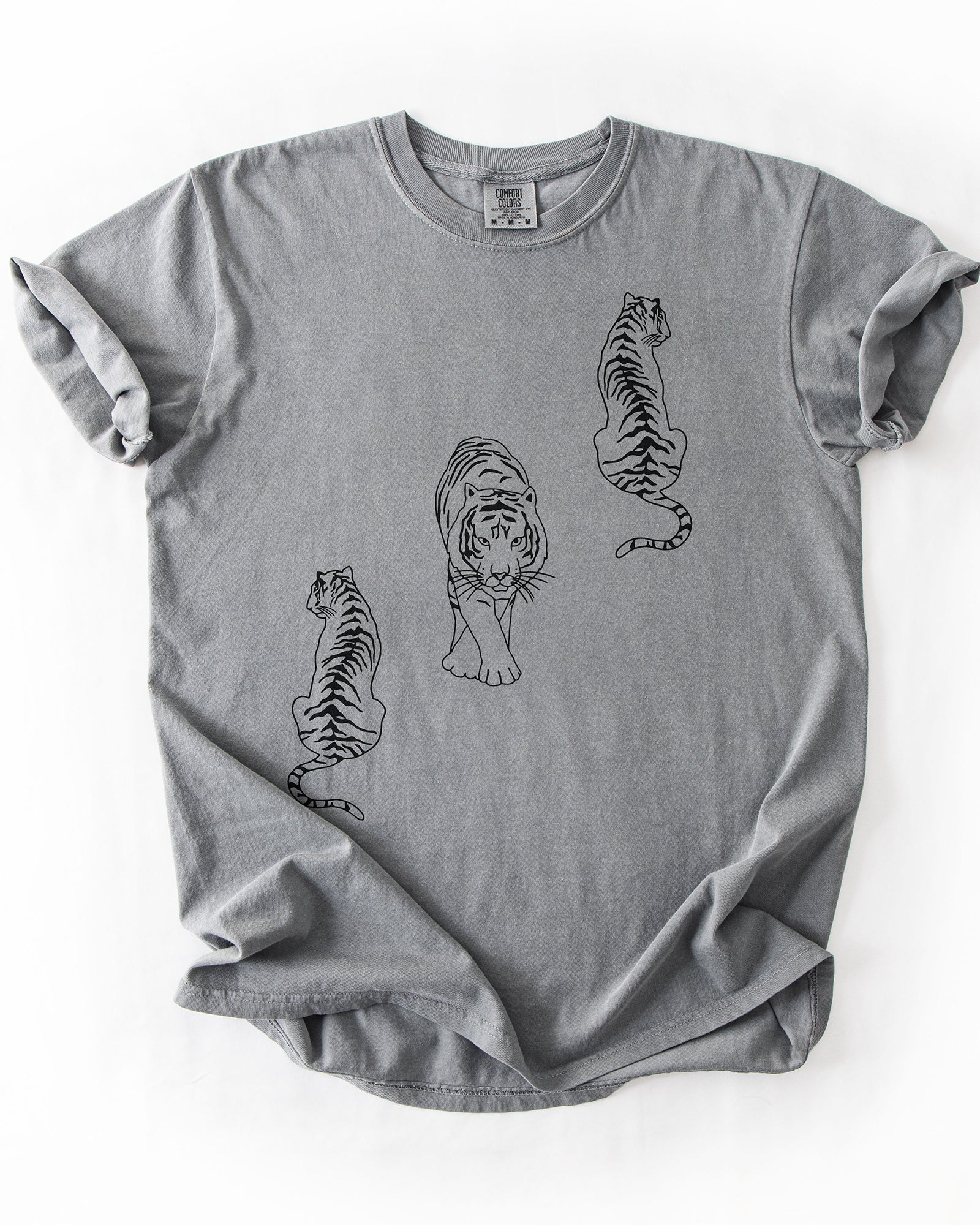 Grey heavyweight graphic tee with scattered black tiger line art design
