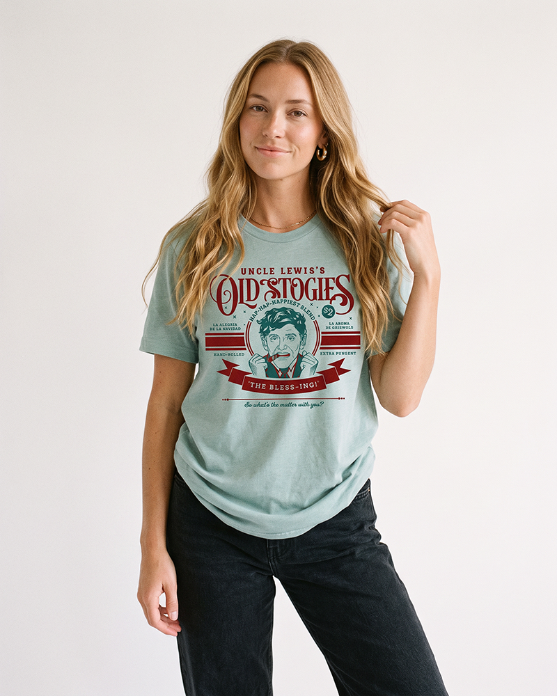 Woman wearing Uncle Lewis Old Stogies lightweight Christmas graphic tee with black jeans