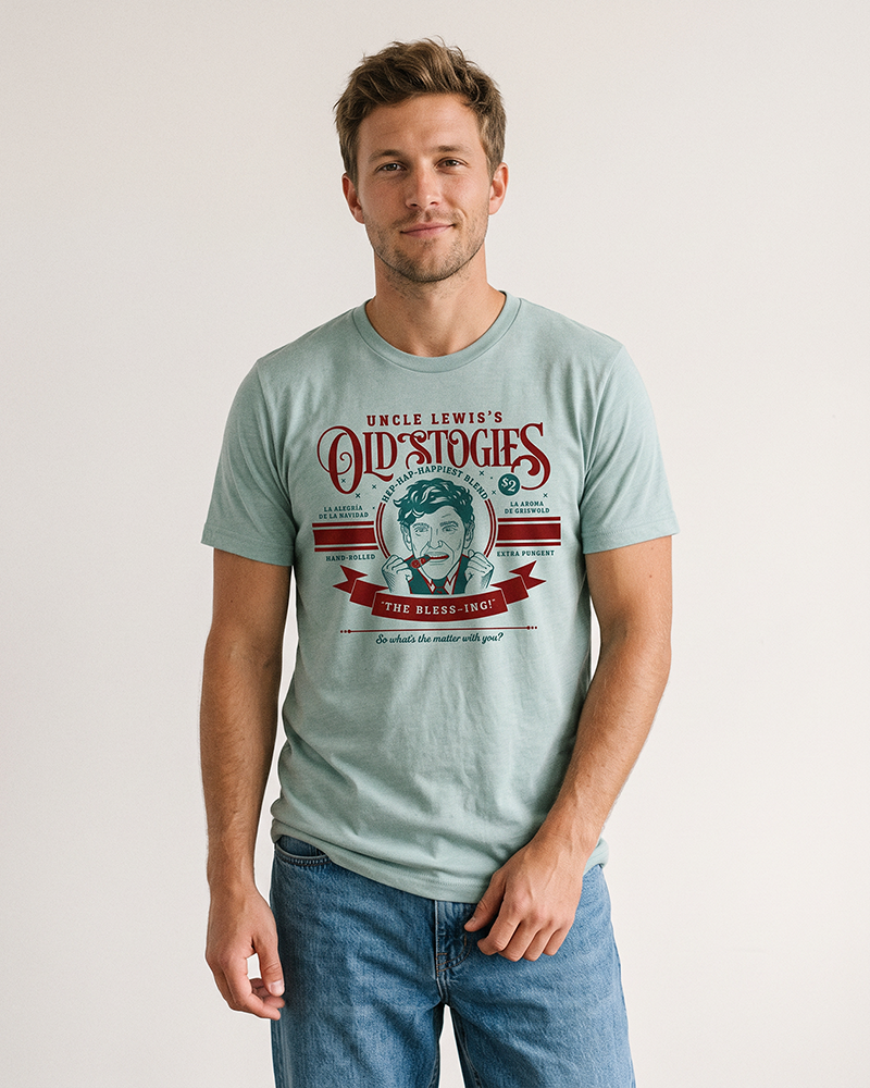 Man wearing Uncle Lewis Old Stogies lightweight Christmas graphic tee in heather dusty blue