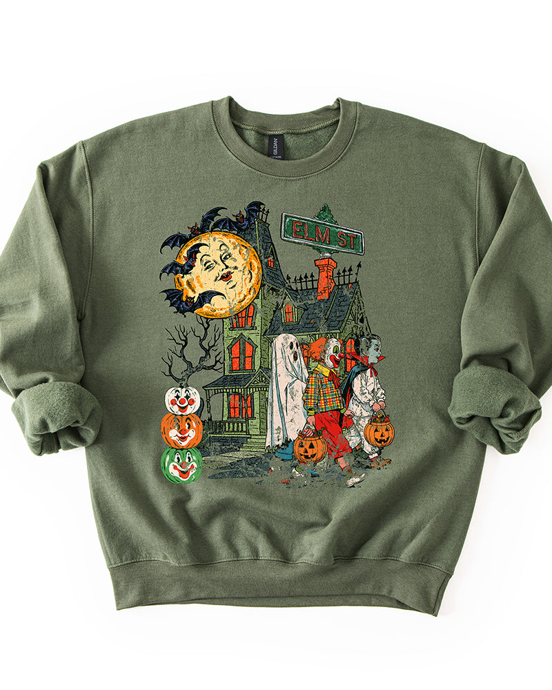Military green vintage Elm St Halloween sweatshirt with haunted house and trick or treaters