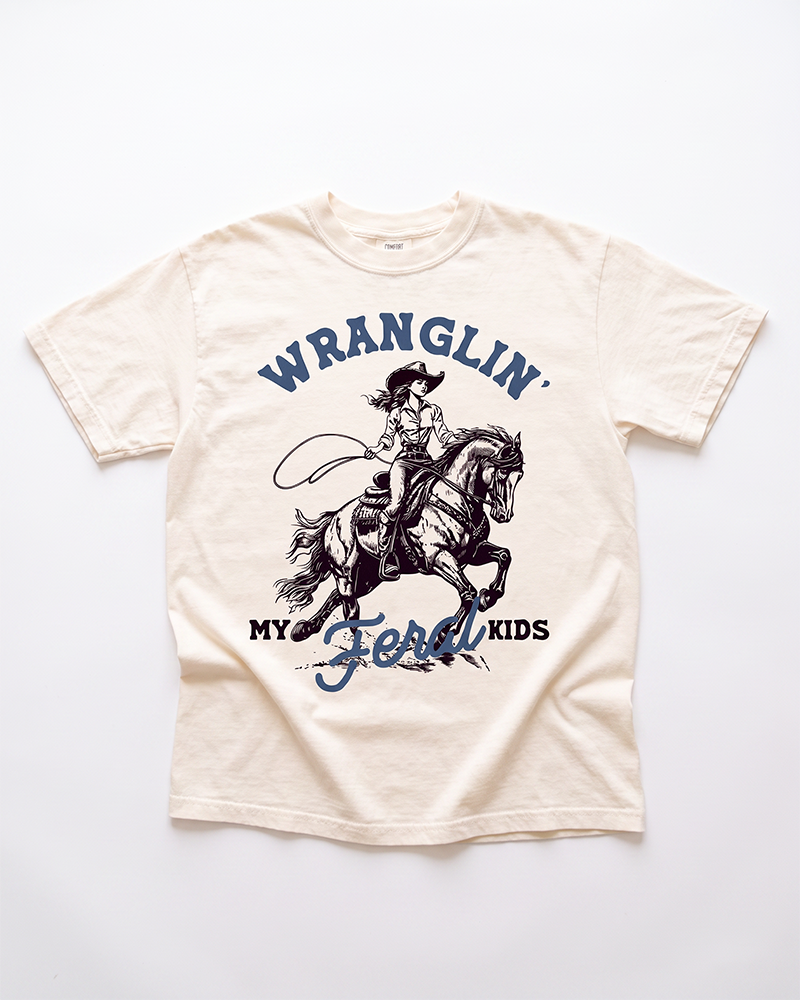 Ivory Wranglin My Feral Kids western mom heavyweight tee with vintage cowgirl horseback graphic